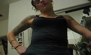 aroused
 girl with numerous tats banged