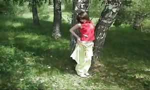 Crazy-minded Russian babe is deep-throating my hard-on right in the woods