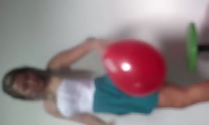 Sit to pop balloon latin woman with large butt