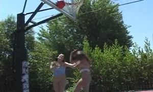 young ladies get bare naked and rub every
 other on outside
 basketball court