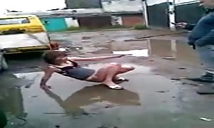 Russian prostitute in a muddy puddle